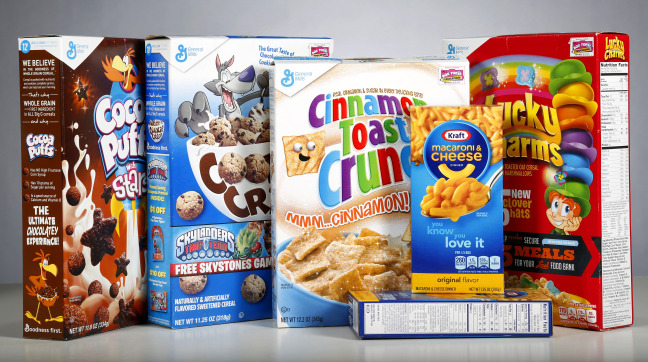 Boxes of cereal and food items with artificial ingredients