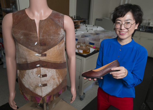 Young-A Lee in the lab with vest and shot prototypes made from new fiber
