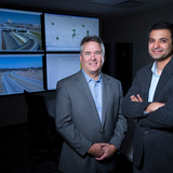 Neal Hawkins and Anuj Sharma in the big data REACTOR Lab.