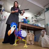 Amanda Petefish-Schrag operating dodo bird puppet