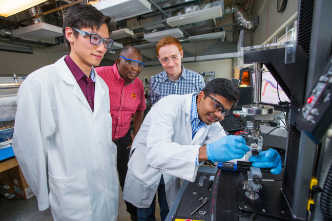 Left to right, Boyce Change, Martin Thuo, Michael Bartlett and Ravi Tutika in an Iowa State materials lab.