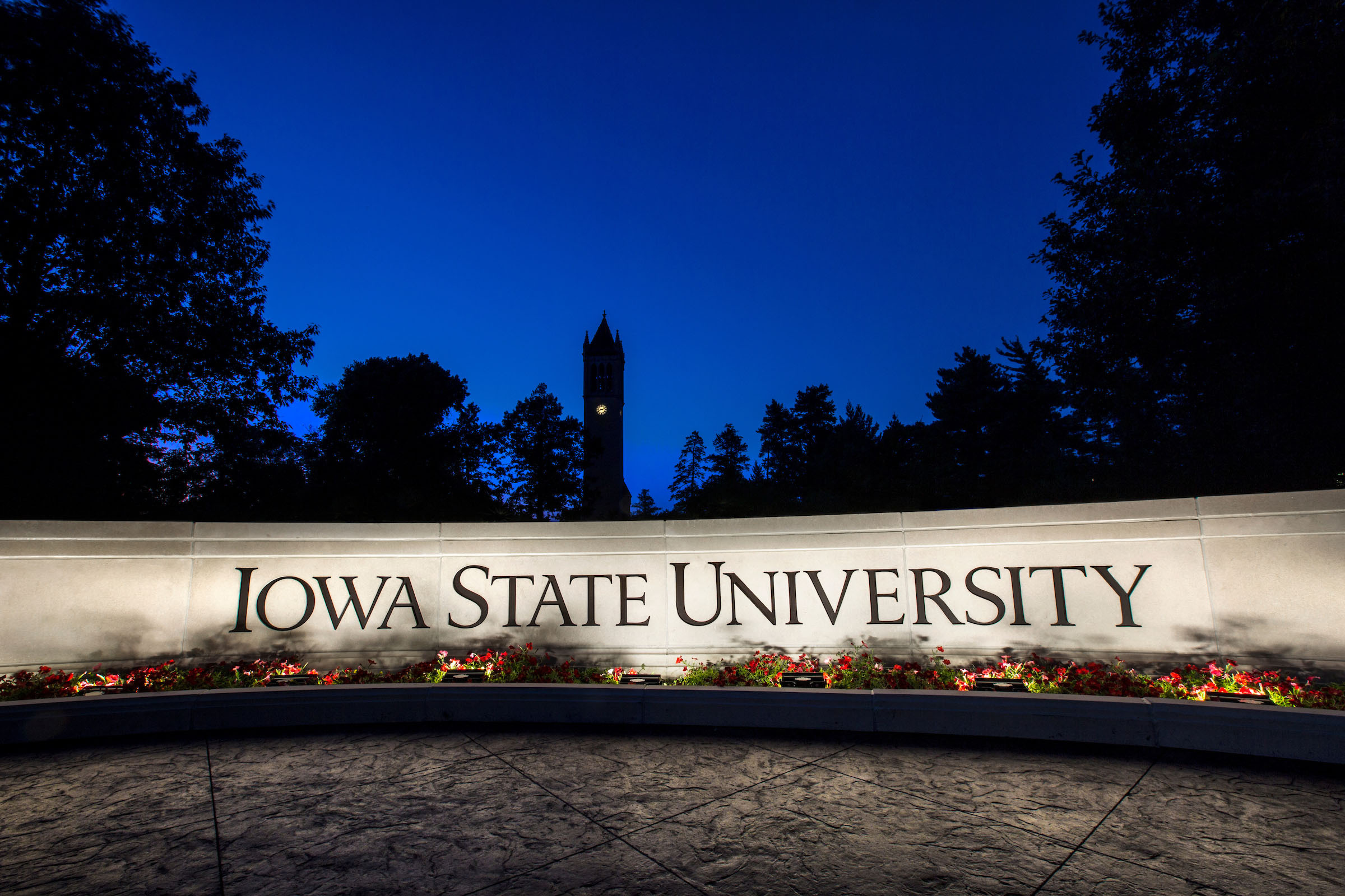 Iowa State Wall and Campanile at night