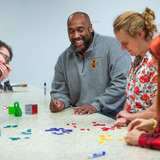 Michael Young and graduate students demonstrating math games