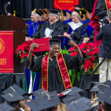 Student celebrating at commencement ceremony