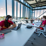 Students studying on the fourth floor of the student innovation center