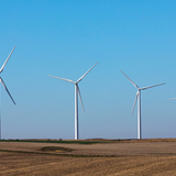 A wind farm harvests energy just north of Ames this fall.