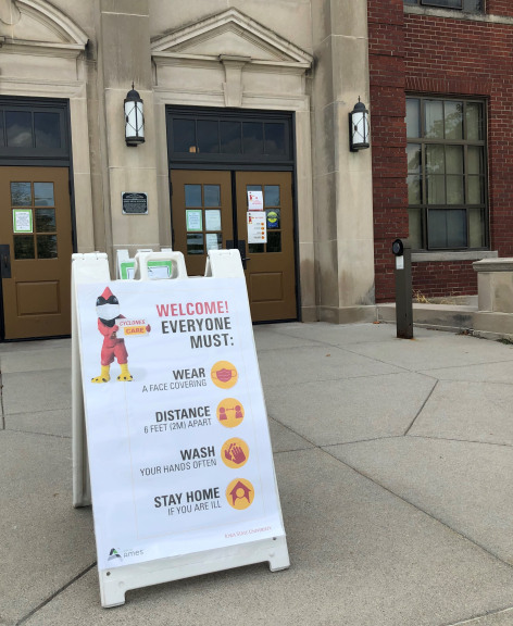 Signage outside Ames city hall promoting cyclones care behaviors