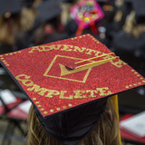 Decorated mortarboard at commencement