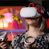 Taylor Doty, a Ph.D. student in psychology and human computer interaction, wears a VR headset at Iowa State, 2022.