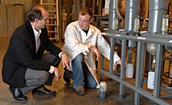 Robert C. Brown and Derek Wissmiller in the fast pyrolysis lab