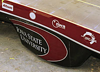 Sol Invictus wheel cover with Iowa State logo.