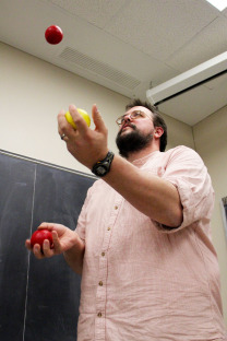 Steve Butler juggling in class