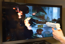 TV screen with image of violent video game