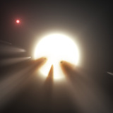 An illustration showing a star behind a shattered comet.