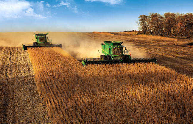 John Deere combines during harvest