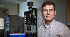 ISU's Steve Martin in lab where he's studying glass batteries