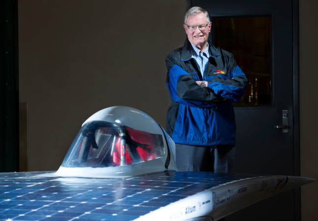 James Hill in the Team PrISUm garage with the team's latest solar racer.
