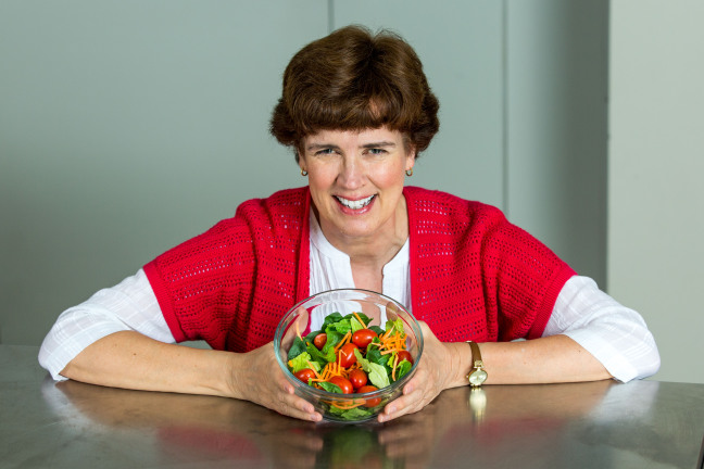 Wendy White holds a bowl of salad