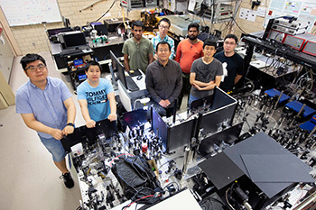 Jigang Wang and his research group in their research laboratory.