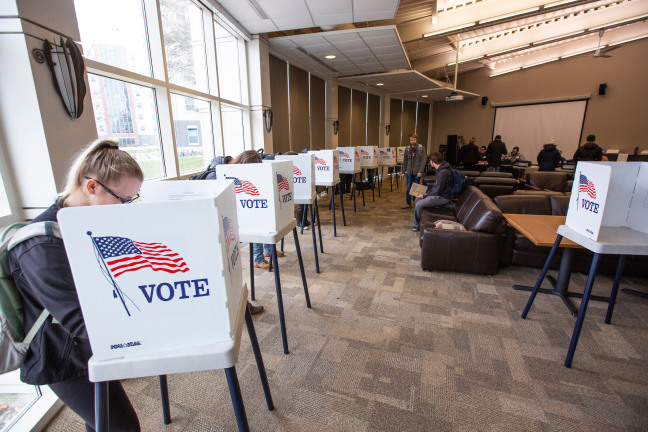 Students voting in Buchanan Hall on campus