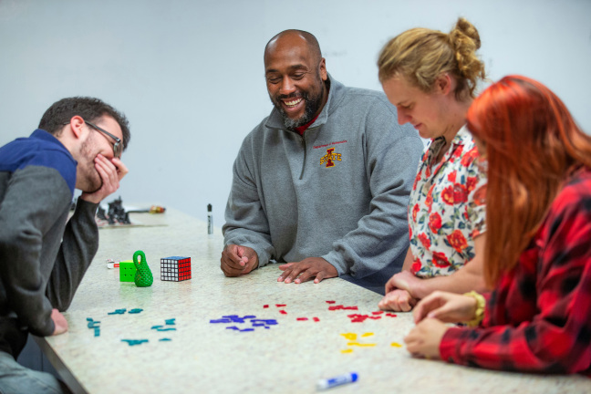 Michael Young and graduate students demonstrating math games