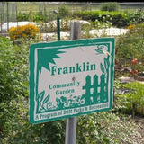 A sign from a community garden in Des Moines