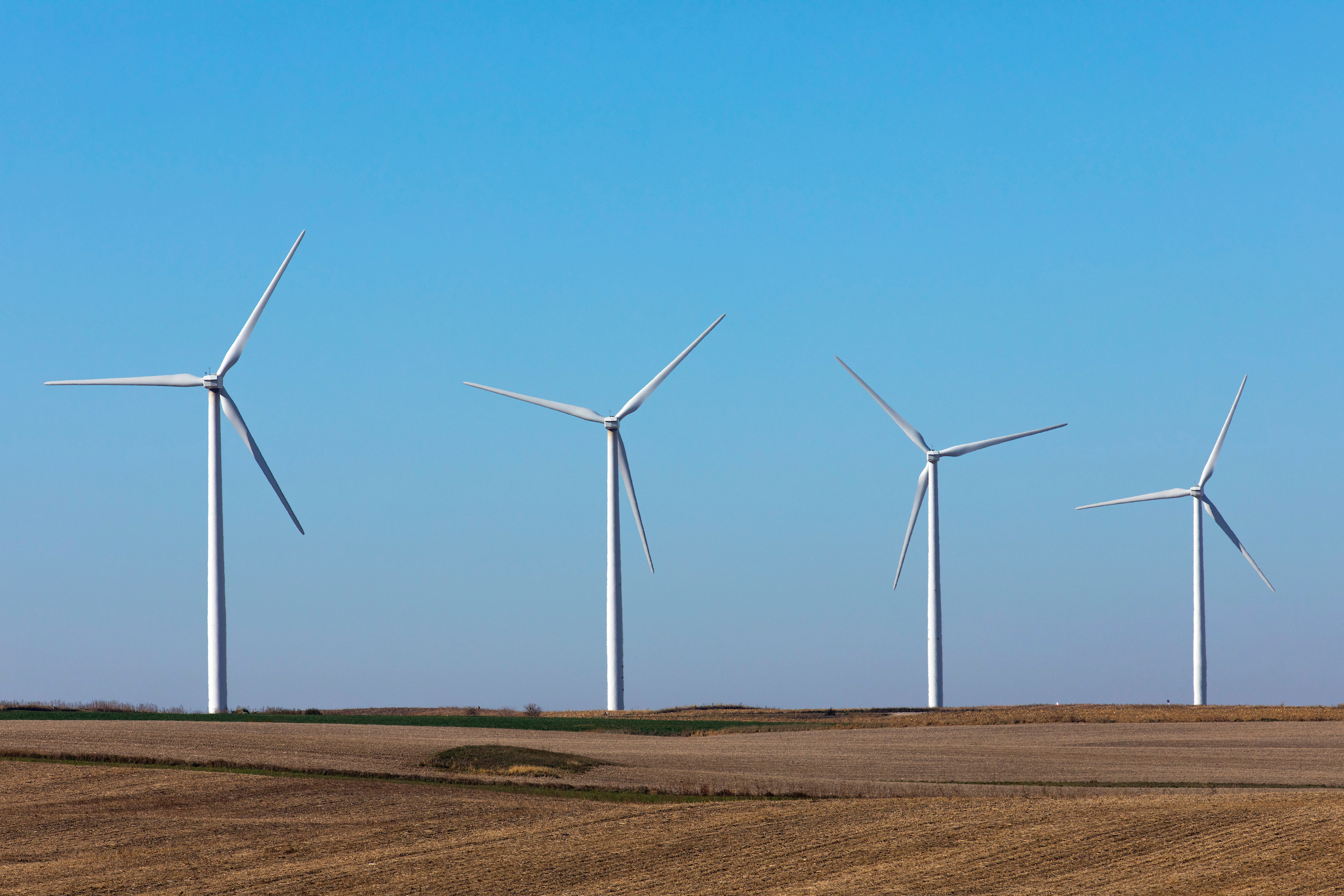 A wind farm harvests energy just north of Ames this fall.