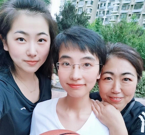 Iowa State doctoral student Qiang Liu, center, with her cousin Qi, left, and aunt Liyan in Qinhuangdao, China.