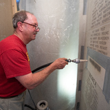 Etching new name into Gold Star Hall