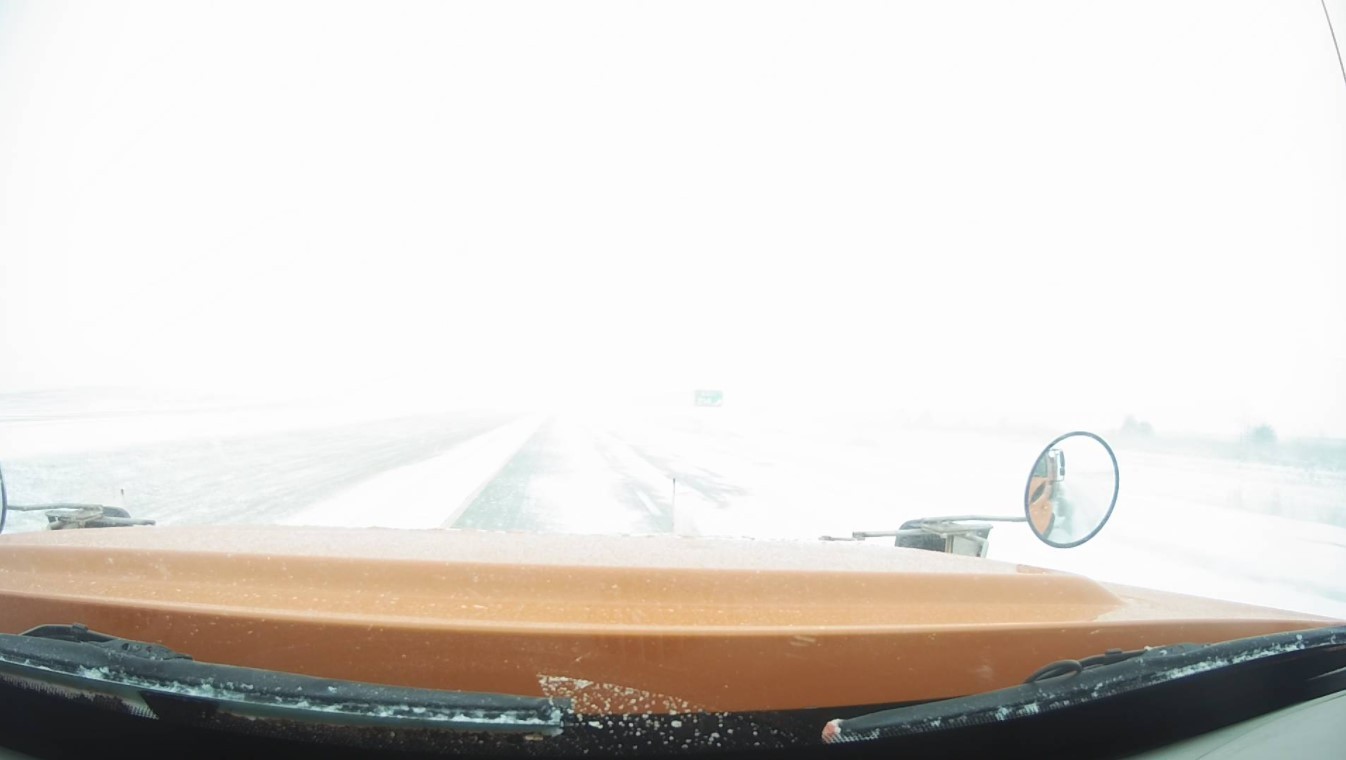 A driver's-eye view of an Iowa snowplow in action.