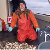 Iowa State's Alan Wanamaker collects clam shells from the Gulf of Maine.