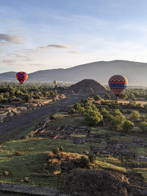 Hot air balloons pass one of the temples at Teotihuacan in Mexico. Photo by Feben Ruscitti.