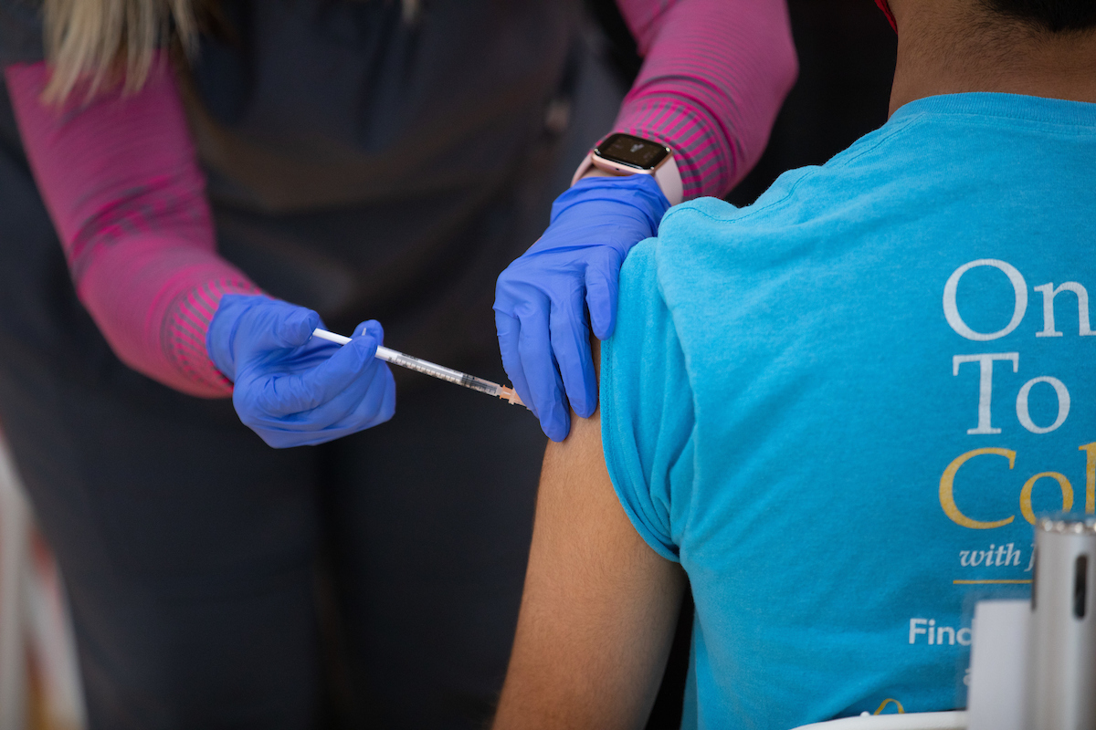 A student receives a COVID-19 vaccine at Iowa State University, May 11, 2021.