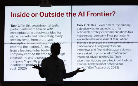 Abram Anders, associate professor of English and interim associate director of the Student Innovation Center, describes new white paper on the use of AI. Photo by Christopher Gannon/Iowa State University.